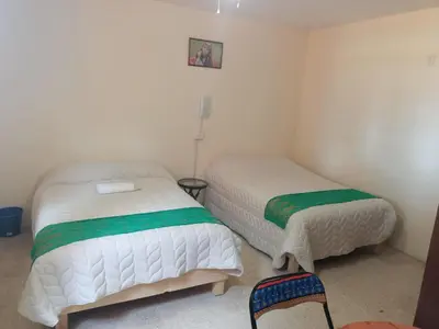 Cama o camas de una habitación en Casa Shanti Oaxaca