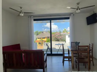 Una televisión o centro de entretenimiento en Departamento Marsopas a 5 minutos a pie de Bahía Carrizalillo!!!4