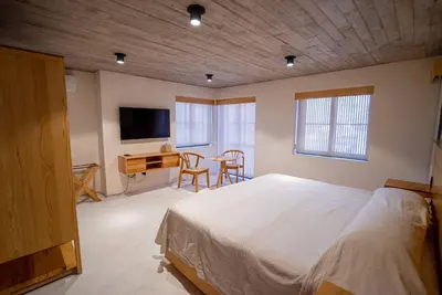 Cama o camas de una habitación en Casa Cruda Oaxaca