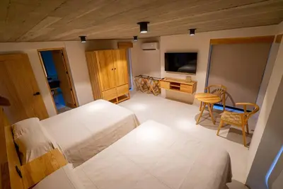 Cama o camas de una habitación en Casa Cruda Oaxaca