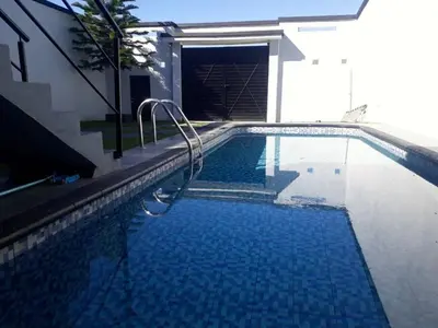 Piscina en o cerca de Casa Hogareña las estacas