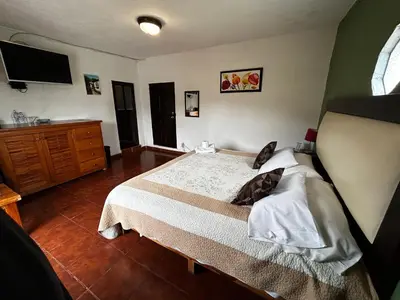 Cama o camas de una habitación en Posada Temazcal Santo Domingo