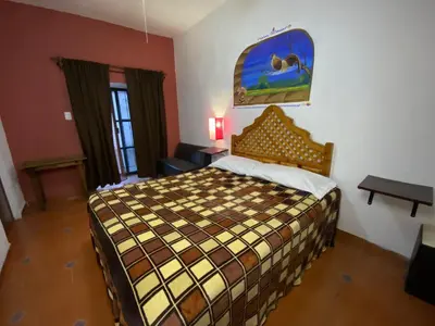 Cama o camas de una habitación en Posada Temazcal Santo Domingo