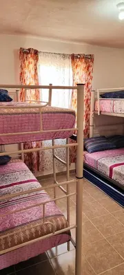 Cama o camas de una habitación en Casa Guacamayas