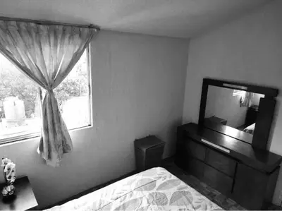 Cama o camas de una habitación en DEPARTAMENTO CON VISTA HERMOSA A 5 MIN DE SIX FLAGS
