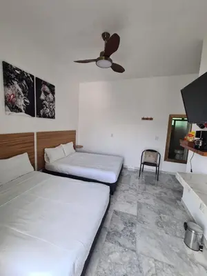 Cama o camas de una habitación en Habitaciones Casa Blanca Oaxtepec Tlayacapan