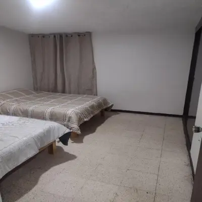 Cama o camas de una habitación en Amplia Casa centro de Teziutlán