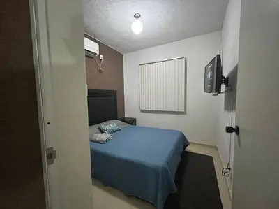 Cama o camas de una habitación en ¡Descubre tu oasis en Acapulco! Casa vacacional.