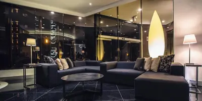 Zona de estar de JF Grand Puebla