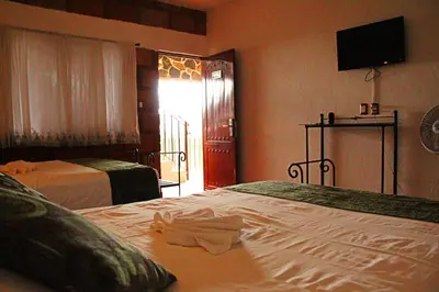 Cama o camas de una habitación en Wellness Center El Secreto