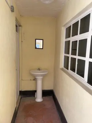 Un baño de Hostal Las Quince Letras