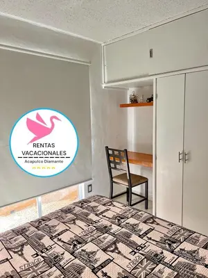 Cama o camas de una habitación en Depa Acapulco diamante alberca wifi