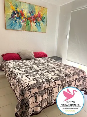 Cama o camas de una habitación en Depa Acapulco diamante alberca wifi
