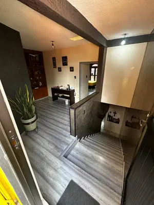 Una televisión o centro de entretenimiento en Casa Marin Framboyan
