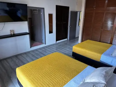 Cama o camas de una habitación en Casa Marin Framboyan