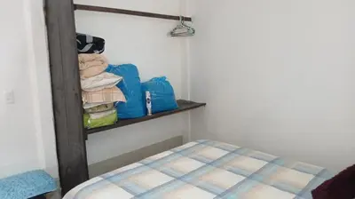 Cama o camas de una habitación en CASA ACOGEDORA