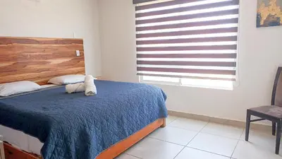 Cama o camas de una habitación en Acapulco diamante, club de playa privado, canchas pádel para 8 huéspedes