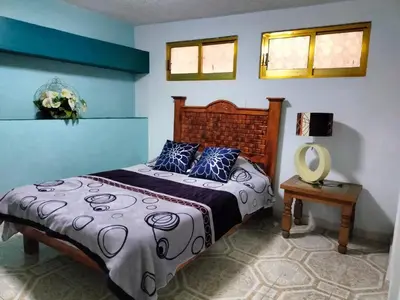 Cama o camas de una habitación en Departamento San Francisco. 4 personas
