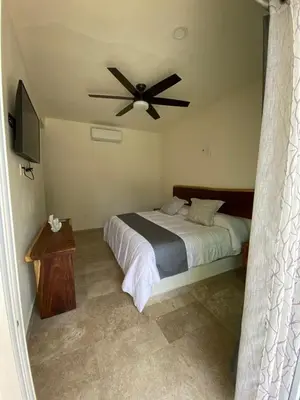 Cama o camas de una habitación en PETRAS HOTEL
