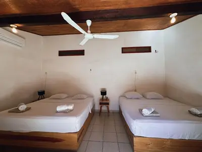 Cama o camas de una habitación en Pacific Buddha