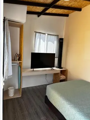 Una televisión o centro de entretenimiento en CASA MARIN Jacaranda