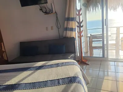 Cama o camas de una habitación en Bungalow Maya Luna