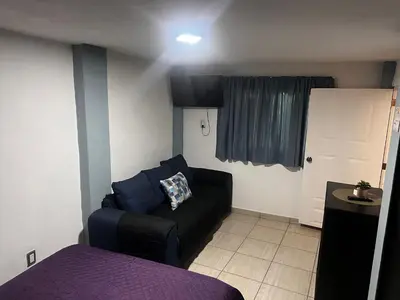 Zona de estar de Departamento de Cantera