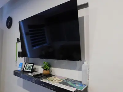 Una televisión o centro de entretenimiento en Depa privado Estadio GNP -Foro Sol-, Palacio de los Deportes