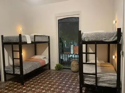 Cama o camas de una habitación en Choco Hostel