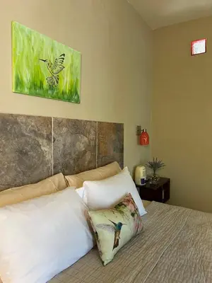 Cama o camas de una habitación en OCEAN OASIS HOTEL - adult only, four casitas boutique resort