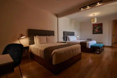 Cama o camas de una habitación en Las Privadas / Casa X By Nardazul