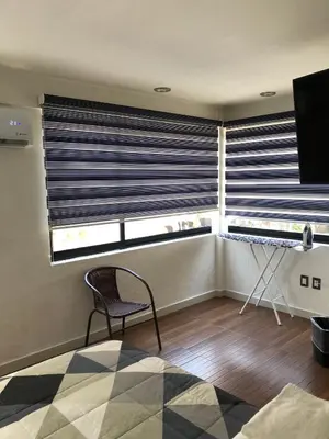 Una televisión o centro de entretenimiento en Casa Mireles