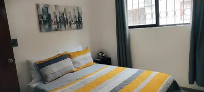 Cama o camas de una habitación en Departamento Familiar Escorpións