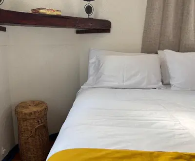 Cama o camas de una habitación en Villa Coyoacan