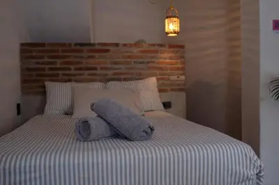 Cama o camas de una habitación en Casa Roma