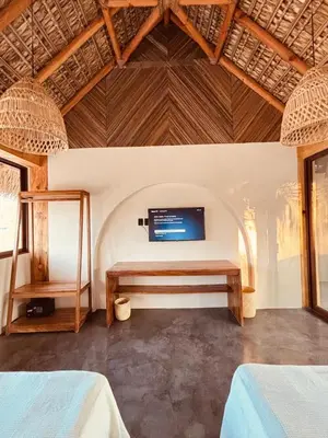 Cama o camas de una habitación en Punta Arena Surf Suites