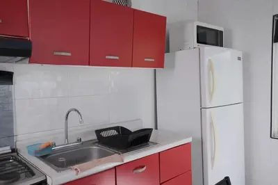Una cocina o zona de cocina en Casa con Alberca adentro cerca de Las Estacas