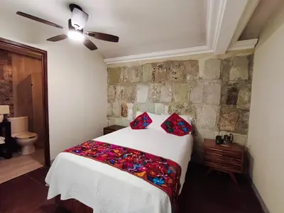Cama o camas de una habitación en CASA FORTALEZA