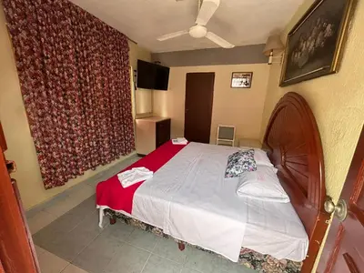 Cama o camas de una habitación en Hotel Capri Playa a una calle de la Playa Regatas