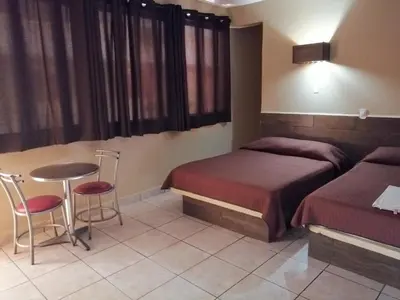 Zona de estar de Hotel Delfines Del Mar