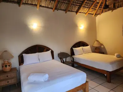 Cama o camas de una habitación en Le Petit Puerto Escondido