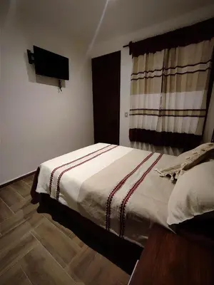 Cama o camas de una habitación en Casa Mictlan. Habitaciones en el Centro de Mitla.