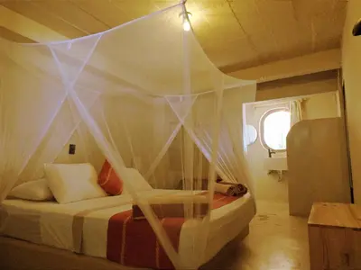 Cama o camas de una habitación en Sebastian de los milagros
