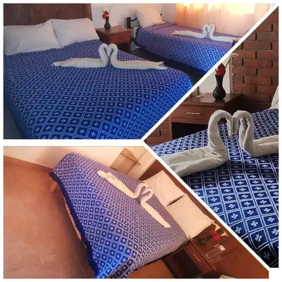 Cama o camas de una habitación en hotel posada los dominicos