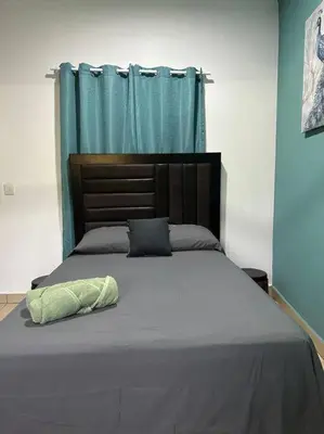 Cama o camas de una habitación en Brisa del mar #7