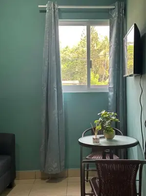 Una televisión o centro de entretenimiento en Brisa del mar #7