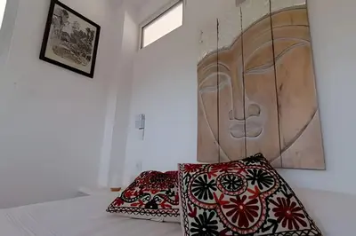Cama o camas de una habitación en Valentina Salchi Buda depa playa virgen internet
