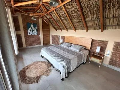 Cama o camas de una habitación en Casa Kava - Estilo y vibra en Puerto Escondido