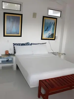 Cama o camas de una habitación en Valentina Salchi A Playas vírgenes Internet veloz