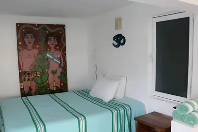 Cama o camas de una habitación en Valentina Salchi A Playas vírgenes Internet veloz